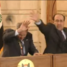 Muntadhar al-Zaidi throws his shoes at then-U.S. President George W. Bush during a press conference in Baghdad, Iraq.