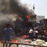Car bomb near market in Baghdad's Sadr City district kills at least 64 people and wounds 40