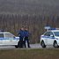 2 men armed with axes, guns attack police station near Moscow, 2 officers injured, one killed