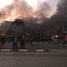 Demonstrators set Gabon parliament on fire